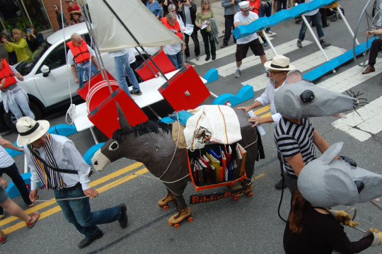 “BiblioBurro was inspired by a story in the news a few years ago of a teacher in Columbia who wandered the countryside giving away books to kids,” said Scott Ruescher, program administrator for the arts in education program at the Harvard Graduate School of Education, where students helped construct the papier-mâché, wood, chicken wire and cardboard critter. “The roller-skates I got from Chez Vous [skating rink] in Dorchester. Used. I paid 50 bucks for two pairs. I didn’t’ know how else to get the burro down the road.” (Greg Cook)