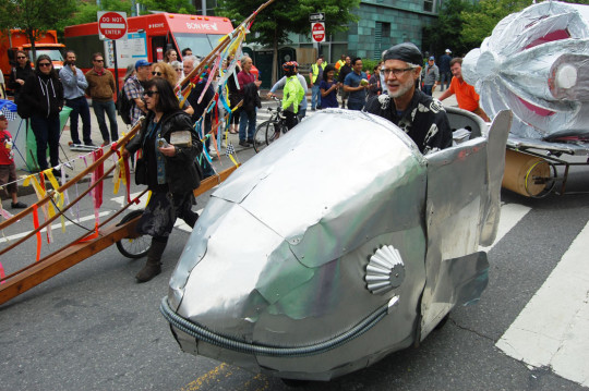 “This was built in 2001 for a Bikes Not Bombs auction,” Bill Turville said of the “Fish Bike” that he rode in today’s race. “The bike was contributed by Bikes Not Bombs. I built the fish around it. It was sold, but it eventually made its way back to me.” (Greg Cook)